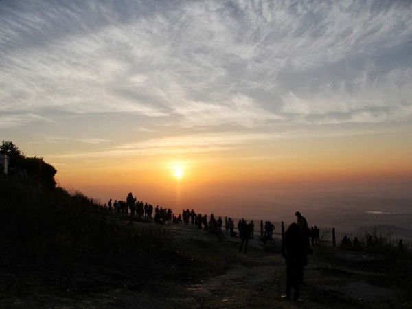 Nandi Hills photos, Visitors thronging at the edge of the hill to view the mesmerising sunrise Nandi Hills photos, Visitors thronging at the edge of the hill to view the mesmerising sunrise