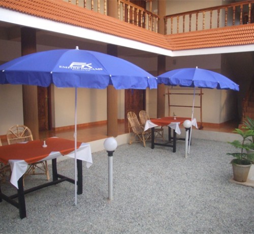 Dining under umbrella