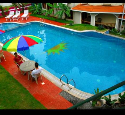Guests relaxing by the pool