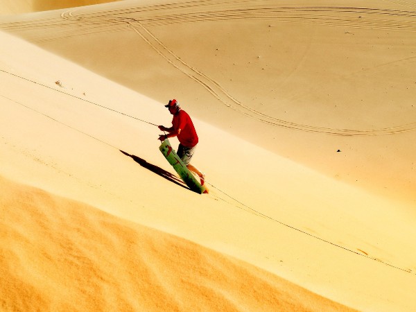 3) Surfing on the sand