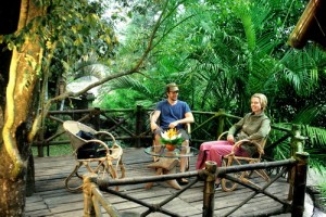 Guests relaxing in sit-out at the Bamboo Tree House Guests relaxing in sit-out at the Bamboo Tree House