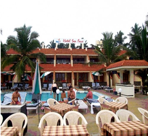 Reclining cots by the pool