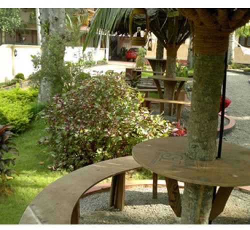 Dining amidst garden Dining amidst garden