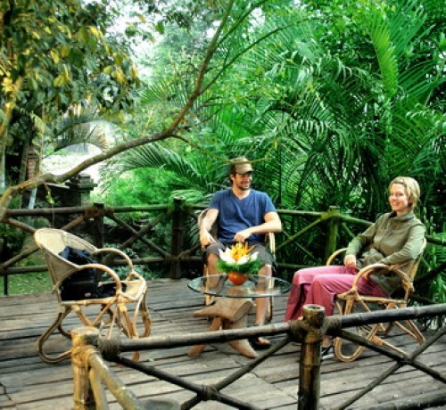 Guests relaxing in sit-out at the Bamboo Tree House