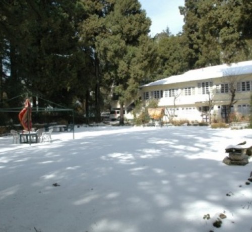 Hotel during snowfall