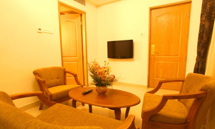 Separate sitting area in suite rooms