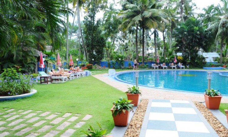 Guests relaxing by the pool
