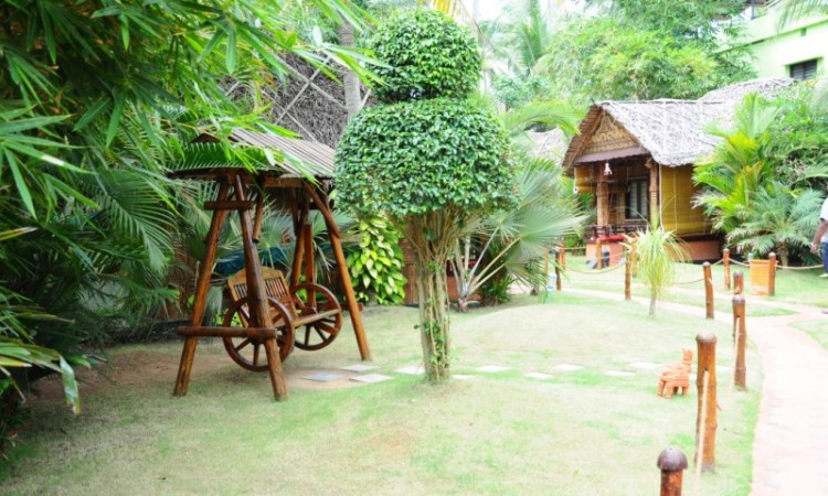 Wooden artefacts amidst greenery
