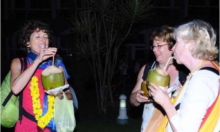 Guests enjoying coconut water Guests enjoying coconut water