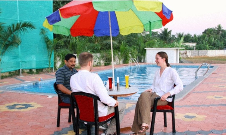 Tourists by the Poolside Tourists by the Poolside